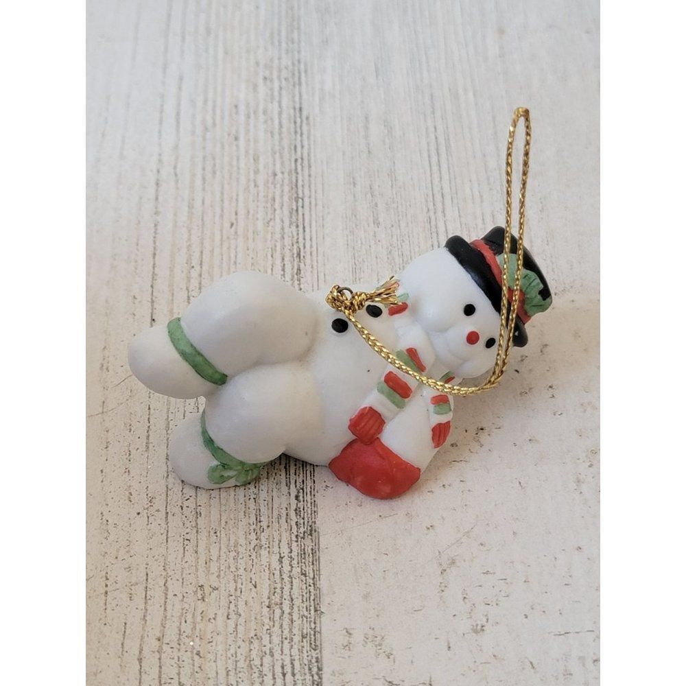 Ceramic sledding snowman mistletoe ornament Xmas decor